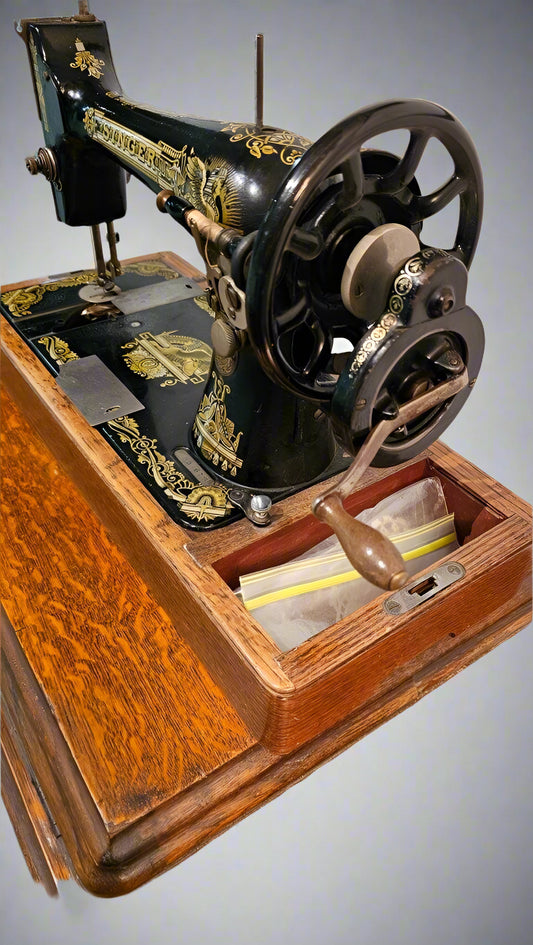 Traveling Hand Crank Sewing Machine – 1900s Portable Cast Iron Model with Wooden Case