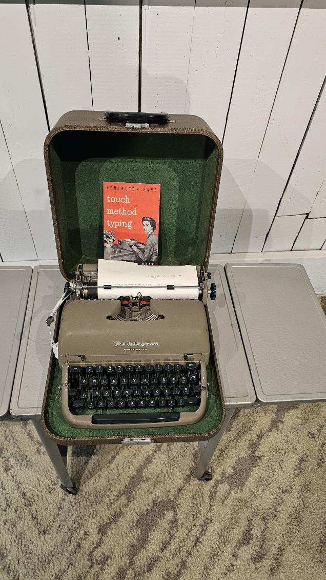 Remington "Quiet Riter" Typewriter with Instructional Manual and Case