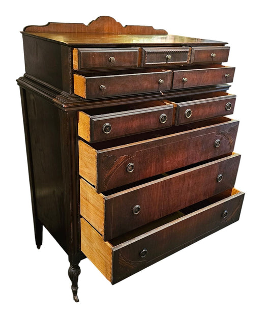 Mahogany Highboy Dresser with Ornate Detailing and Brass Hardware