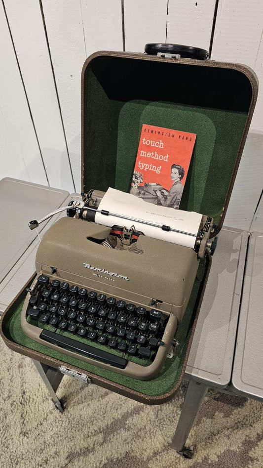 Remington "Quiet Riter" Typewriter with Instructional Manual and Case